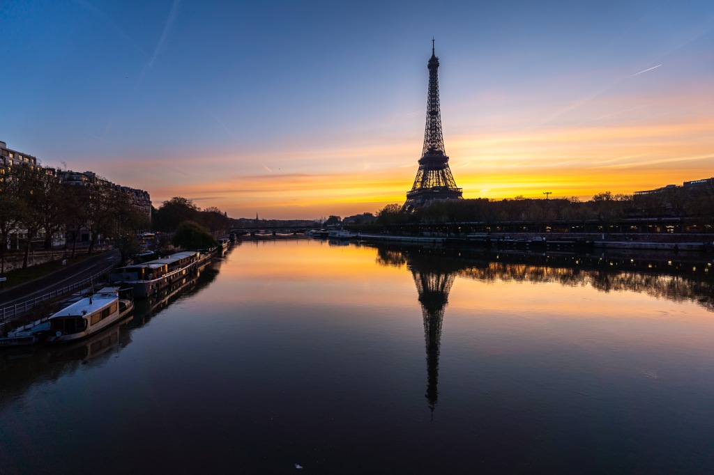 Paris, France: Eiffel Tower before sunrise, viewed from Pont Bir-Hakeim